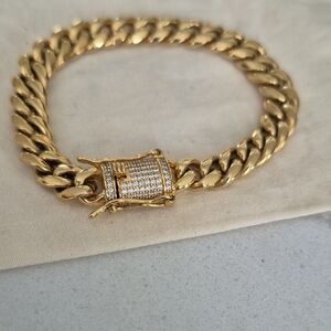 Elegant Gold Bracelet with Silver Accents
